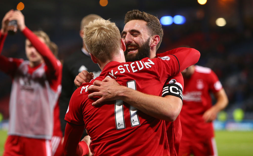 28th October 2018, Hampden Park, Glasgow, Scotland; Scottish League Cup football, semi final, Aberdeen versus Rangers; Graeme Shinnie of Aberdeen celebrates with Gary Mackay-Steven of Aberdeen (photo by Vagelis Georgariou/Action Plus via Getty Images)