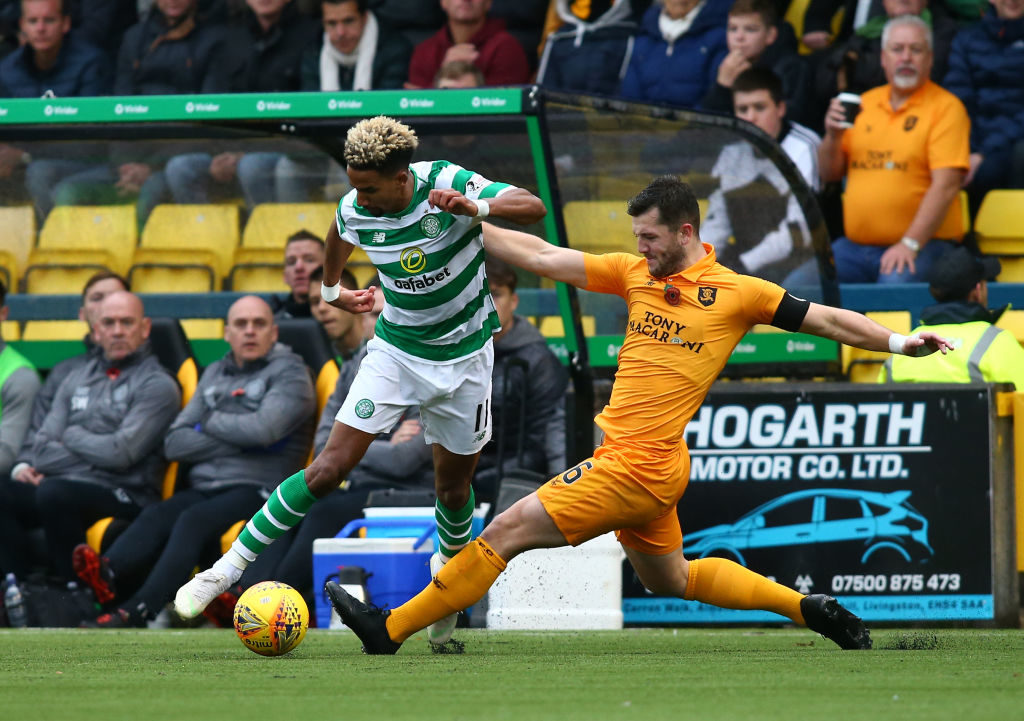 11th November 2018, Tony Macaroni Arena, Livingston, Scotland; Ladbrokes Premiership football, Livingston versus Celtic; Craig Halkett of Livingston tackles Scott Sinclair of Celtic (photo by Vagelis Georgariou/Action Plus via Getty Images)