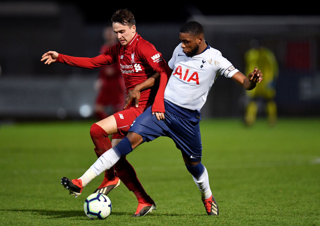 STEVENAGE, ENGLAND - JANUARY 07: Liam Miller of Liverpool and Japhet Tanganga of Tottenham Hotspur in action during the Premier League 2 match between Tottenham Hotspur and Liverpool at The Lamex Stadium on January 7, 2019 in Stevenage, England. transfers