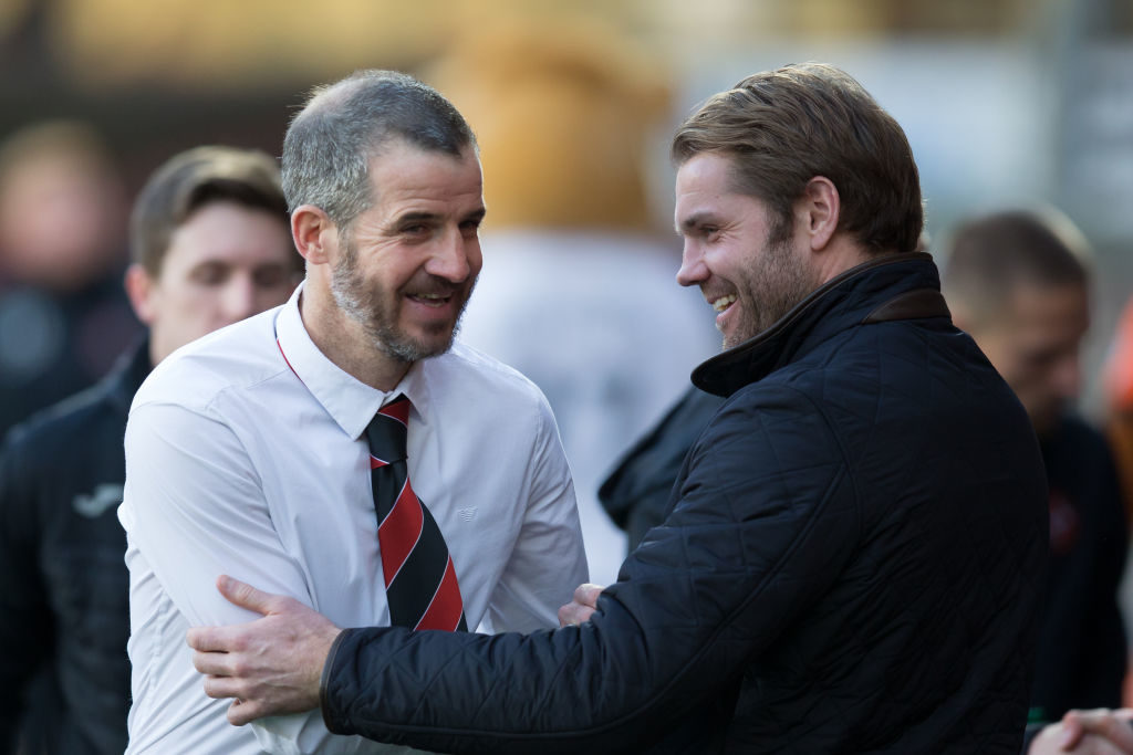 12th January 2019, Tannadice Park, Dundee, Scotland; Scottish Championship football, Dundee United versus Dunfermline Athletic; Dunfermline Athletic head coach Stevie Crawford shakes hands with Dundee United manager Robbie Neilson prior to kick off