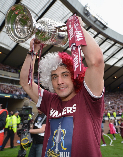 GLASGOW, SCOTLAND - MAY 19: Rudi Skacel of Hearts lifts the William Hill Scottish Cup after winning the William Hill Scottish Cup Final between Hibernian and Hearts at Hampden Park on May 19, 2012 in Glasgow, Scotland. (Photo by Jeff J Mitchell-Pool/Getty Images)