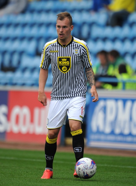 CARLISLE, ENGLAND - AUGUST 01: Gregg Wylde of St Mirren in action during the pre season friendly match between Carlisle United and St Mirren at Brunton Park on August 01, 2014 in Carlisle, England. (Photo by Chris Brunskill/Getty Images)