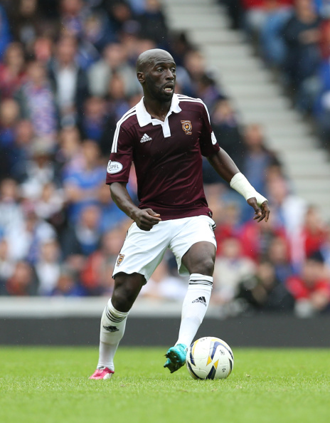 GLASGOW, SCOTLAND - AUGUST 10:  Morgaro Gomis of Hearts controls the ball during the Scottish Championship Opening League Match between Rangers and Hearts, at Ibrox Stadium on August 10, 2014 Glasgow, Scotland. (Photo by Ian MacNicol/Getty Images)