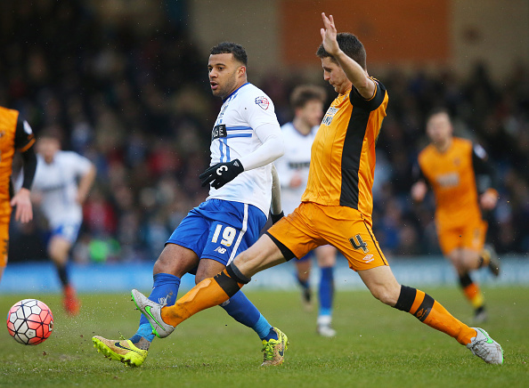 BURY, ENGLAND - JANUARY 30: Tom Soares of Bury and Alex Bruce of Hull City compete for the ball during The Emirates FA Cup fourth round match at between Bury and Hull City at Gigg Lane on January 30, 2016 in Bury, England.