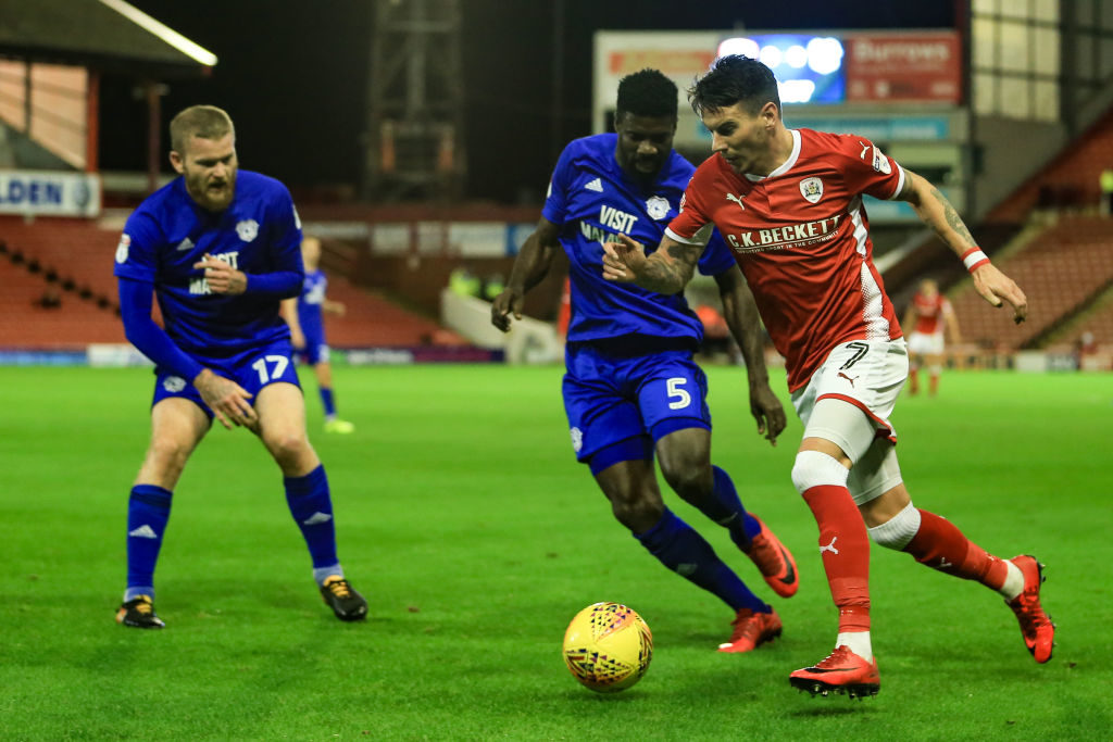 21st November 2017, Oakwell, Barnsley, England; EFL Championship football, Barnsley versus Cardiff; Adam Hammill of Barnsley FC edges past Bruno Ecuele Manga of Cardiff City (Photo by Mark Cosgrove/Action Plus via Getty Images)