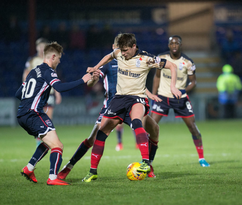 2nd December 2017, Global Energy Stadium, Dingwall, Scotland; Scottish Premiership football, Ross County versus Dundee; Dundees Scott Allan holds the ball despite the attentions of Ross Countys Davis Keillor-Dunn and Jamie Lindsay 