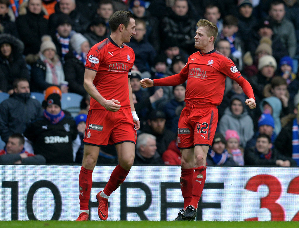 GLASGOW, SCOTLAND - MARCH 04: Aaron Muirhead of Falkirk celebrates scoring a goal in the first half with his team mates during the Scottish Cup Quarter Final match between Rangers and Falkirk at Ibrox Stadium on March 4, 2018 in Glasgow, Scotland.