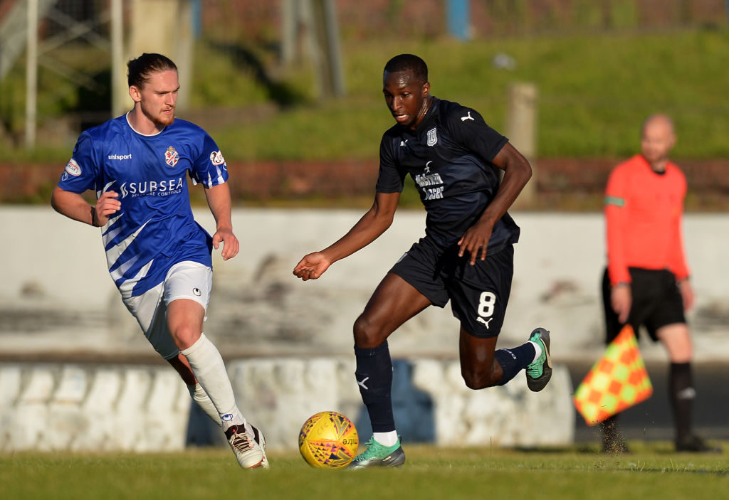 COWDENBEATH, SCOTLAND - JULY 02: Glen Kamara of Dundee is challenged by Kyle Miller of Cowdenbeath during the pre-season friendly between Cowdenbeath and Dundee at Central Park on July 2, 2018 in Cowdenbeath, Scotland.