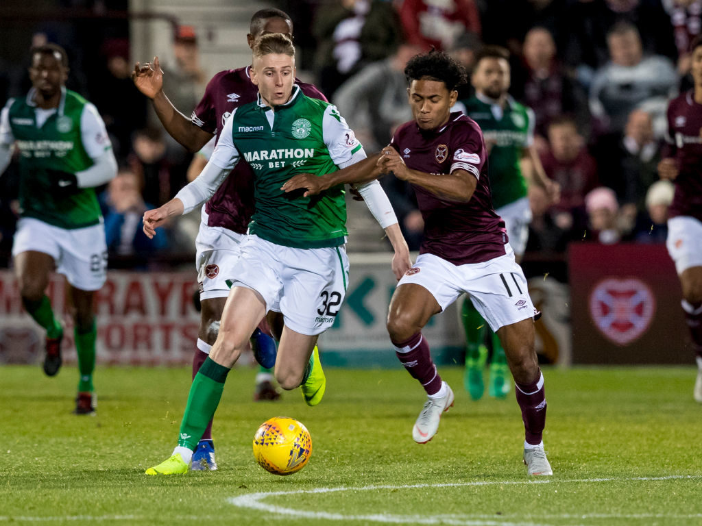 31st October 2018, Tynecastle Park, Edinburgh, Scotland; Ladbrokes Premiership football, Heart of Midlothian versus Hibernian; Oli Shaw of Hibernian and Demetri Mitchell of Hearts