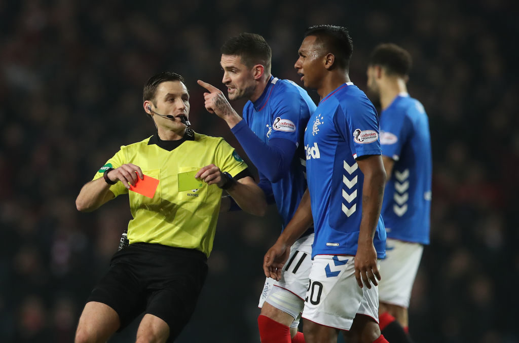 GLASGOW, SCOTLAND - DECEMBER 05: Kyle Lafferty of Rangers remonstrates with referee Steven McLean after Alfredo Morelos of Rangers lis given a second yellow card during the Scottish Ladbrokes Premiership match between Rangers and Aberdeen at Ibrox Stadium on December 5, 2018 in Glasgow, Scotland.