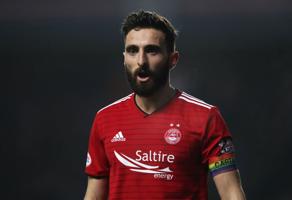 GLASGOW, SCOTLAND - DECEMBER 05: Graeme Shinnie of Aberdeen is seen wearing a Rainbow arm band during the Scottish Ladbrokes Premiership match b