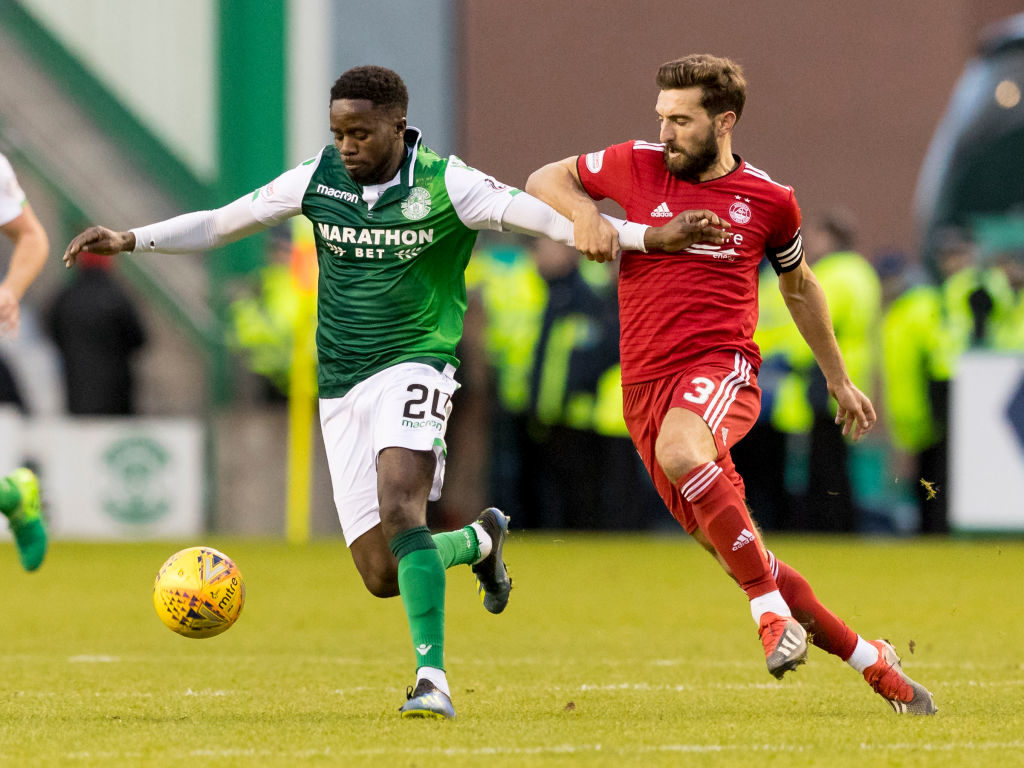 2nd February 2019, Easter Road, Edinburgh, Scotland; Ladbrokes Premiership football, Hibernian versus Aberdeen; Gael Bigirimana of Hibernian and Graeme Shinnie of Aberdeen compete for possession of the ball