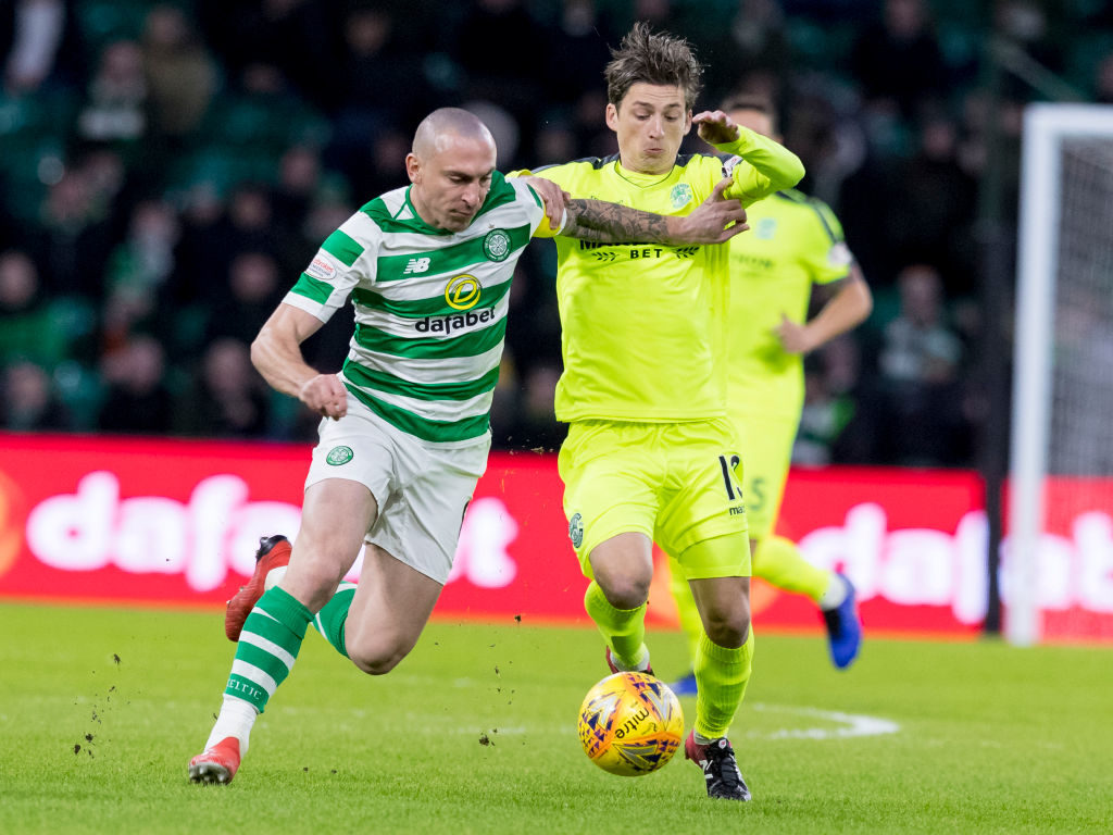 6th February 2019, Celtic Park, Glasgow, Scotland; Ladbrokes Premiership football, Celtic versus Hibernian; Scott Brown of Celtic and Ryan Gauld of Hibernian compete for possession of the ball