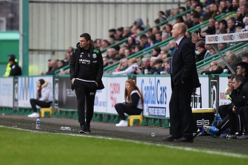 EDINBURGH, SCOTLAND - FEBRUARY 16: New manager Paul Heckingbottom (L) Manager of Hibernian FC paces the touchline during the Ladbrokes Premiership match between Hibernian and Hamilton Academical at Easter Road on February 16, 2019 in Edinburgh, United Kingdom.
