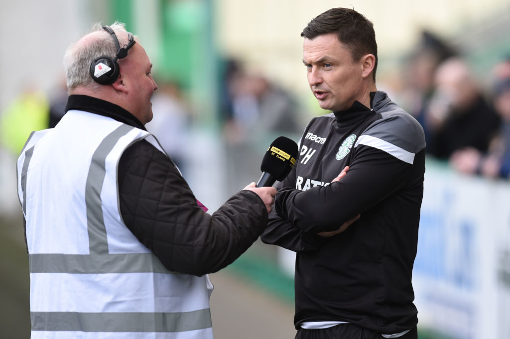 EDINBURGH, SCOTLAND - FEBRUARY 16: Paul Heckingbottom (R) Manager of Hibernian FC speaks to the media before the Ladbrokes Premiership match between Hibernian and Hamilton Academical at Easter Road on February 16, 2019 in Edinburgh, United Kingdom.