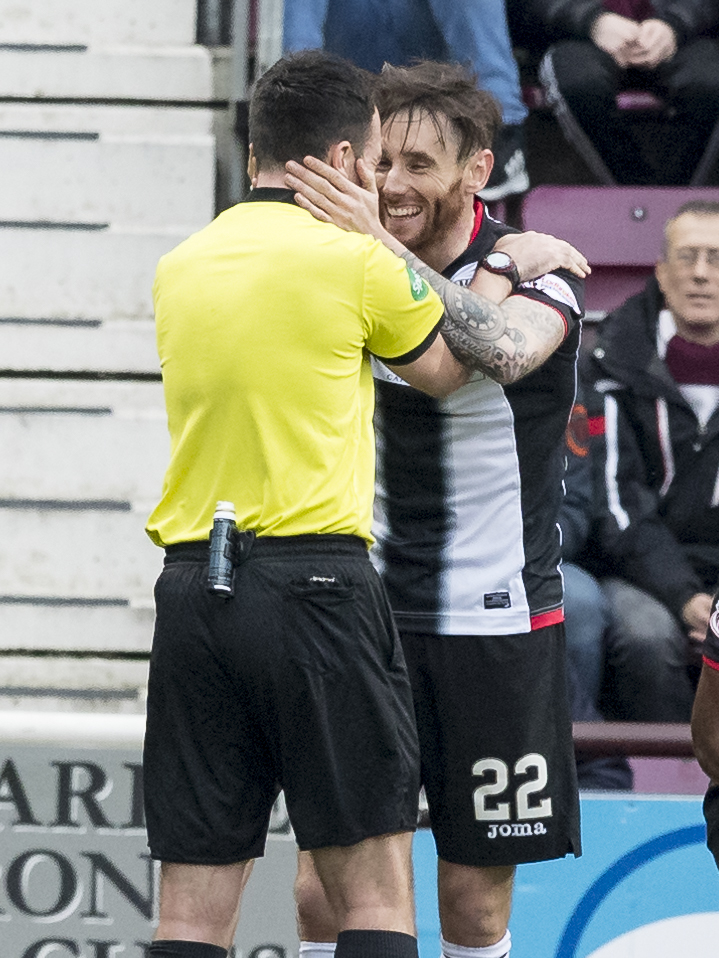 23rd February 2019, Tynecastle Park, Edinburgh, Scotland; Ladbrokes Premiership football, Heart of Midlothian versus St Mirren; Referee Don Robertson shares a joke with Greg Tansey of St Mirren
