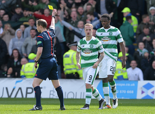 MOTHERWELL, SCOTLAND - APRIL 9 : Leigh Griffiths of Celtic is yellow carded by referee Willie Collum after celebrating scoring the opening goal of the game during the Ladbrokes Scottish Premiership match between Celtic FC and Motherwell FC at Fir Park on April 9, 2016 in Glasgow, Scotland.