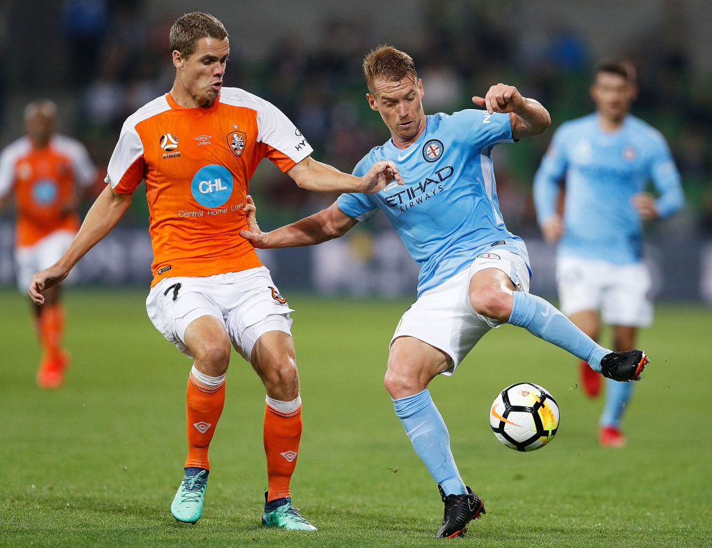 MELBOURNE, AUSTRALIA - APRIL 20: Oliver Bozanic of Melbourne City and Thomas Kristensen of Brisbane Roar contrst the ball during the A-League Elimination Final match between the Melbourne City and the Brisbane Roar at AAMI Park on April 20, 2018 in Melbourne, Australia.