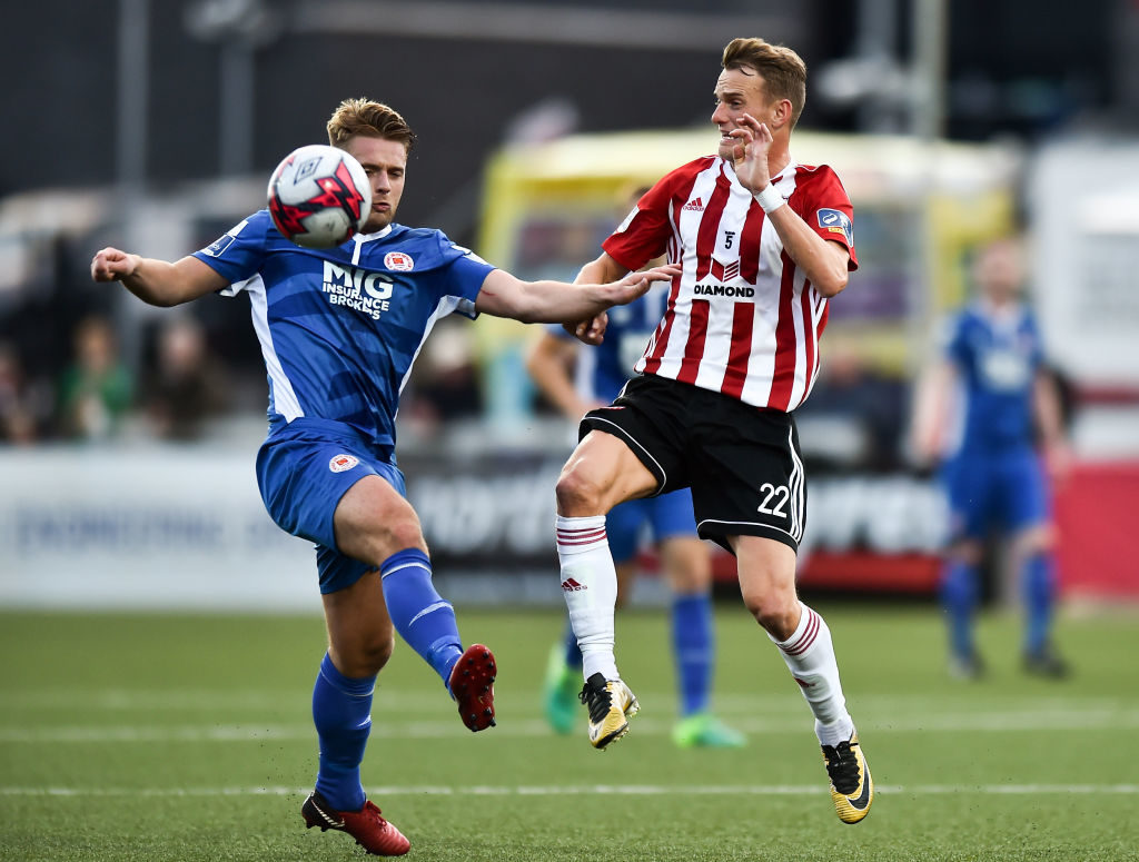 Derry , United Kingdom - 24 August 2018; Conor Clifford of St Patrick's Athletic in action against Dean Shiels of Derry City during the Irish Daily Mail FAI Cup Second Round match between Derry City and St. Patrick's Athletic at Brandywell Stadium, in Derry. 