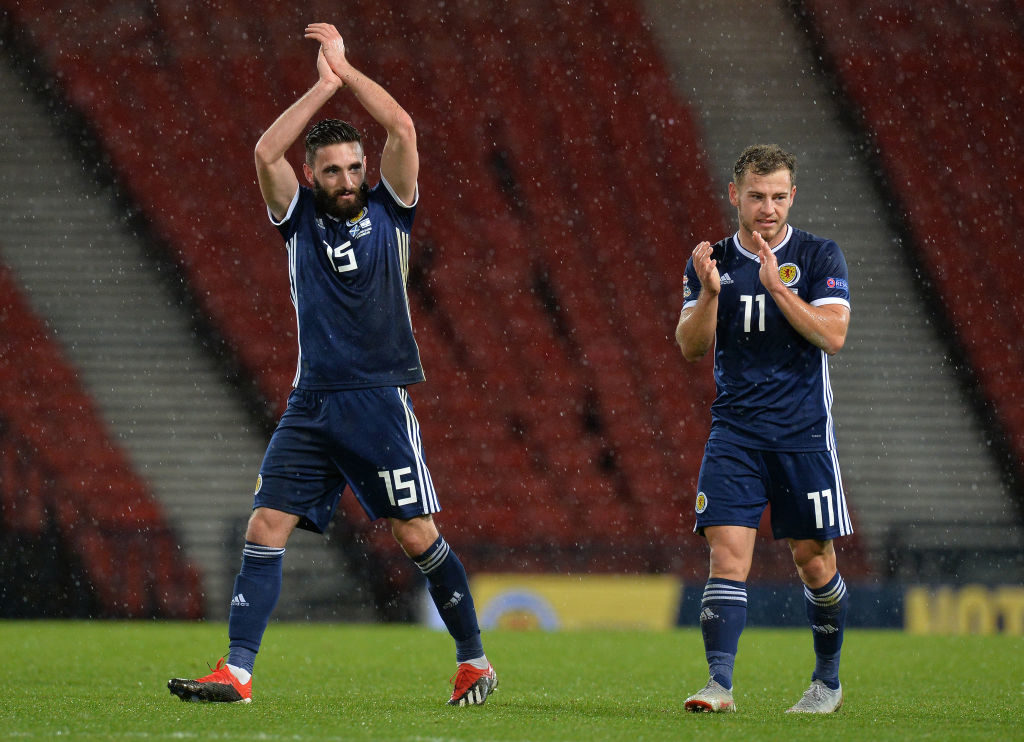 GLASGOW, SCOTLAND - NOVEMBER 20: Graeme Shinnie (L), and Ryan Fraser of Scotland applaud the Scotland fans at the final whistle during the UEFA Nations League C group one match between Scotland and Israel at Hampden Park on November 20, 2018 in Glasgow, United Kingdom.