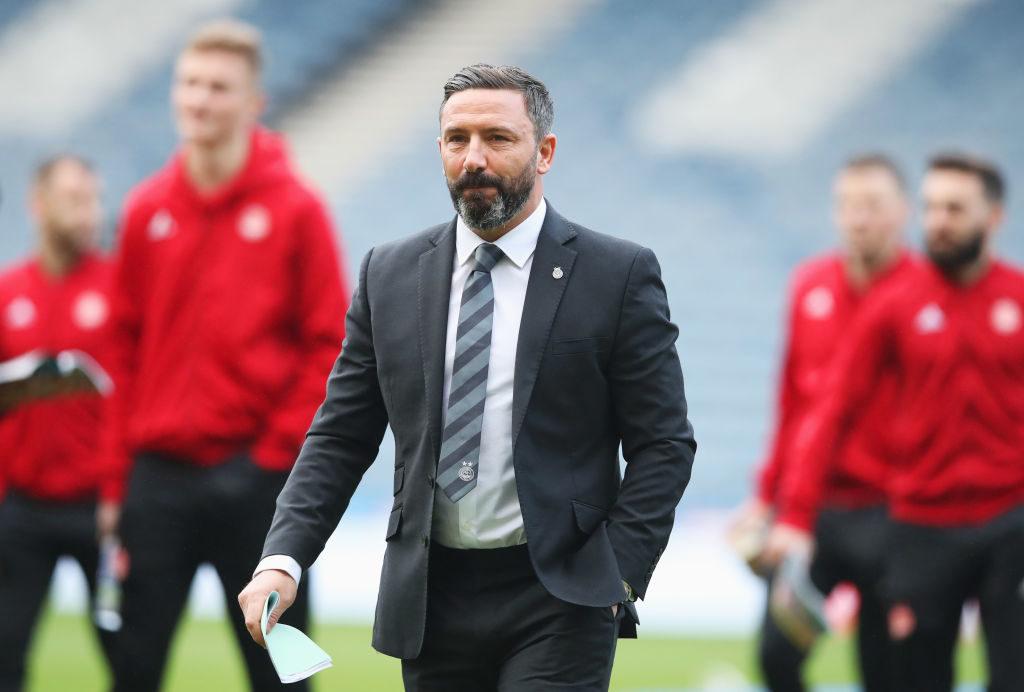 GLASGOW, SCOTLAND - DECEMBER 02: Derek McInnes manager of Aberdeen walks on the pitch with players prior to the Betfred Cup Final between Celtic and Aberdeen at Hampden Park on December 2, 2018 in Glasgow, Scotland. 