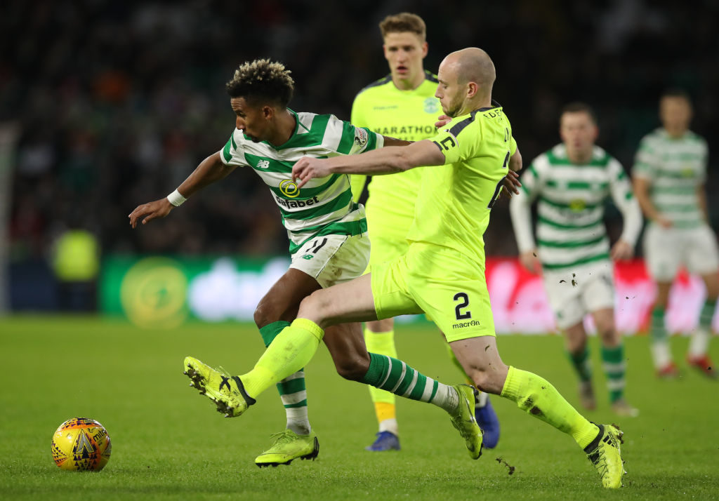 GLASGOW, SCOTLAND - FEBRUARY 06: Scott Sinclair of Celtic vies with David Gray of Hibernian uring the Ladbrokes Premiership match between Celtic and Hibernian at Celtic Park on February 6, 2019 in Glasgow, United Kingdom. 