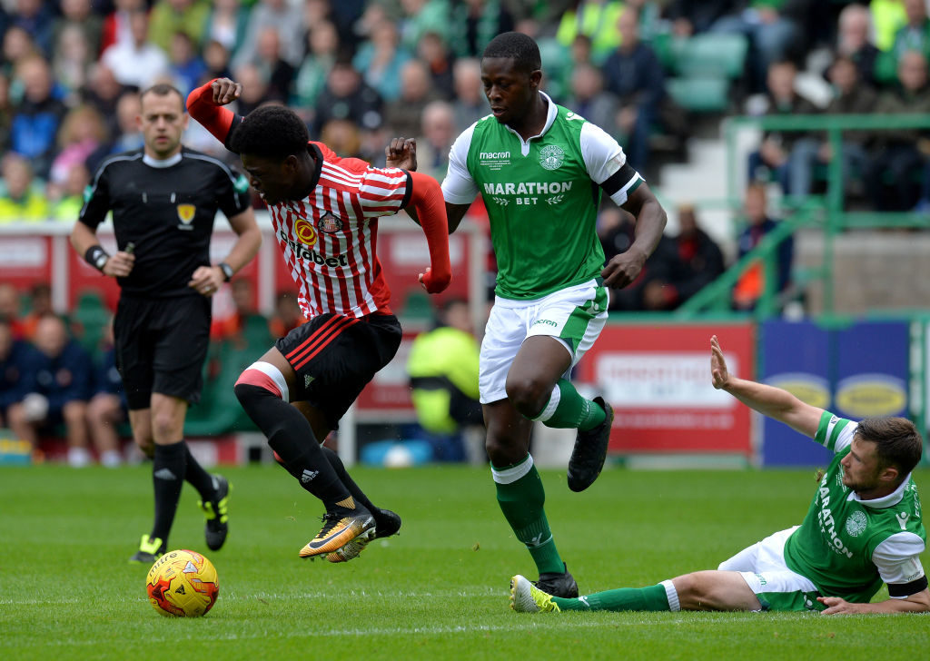 EDINBURGH, SCOTLAND - JULY 09: Josh Maja of Sunderland is tackled by Marvin Bartley and Lewis Stevenson of Hibernian during the pre season friendly between Hibernian and Sunderland at Easter Road on July 9, 2017 in Edinburgh, Scotland.