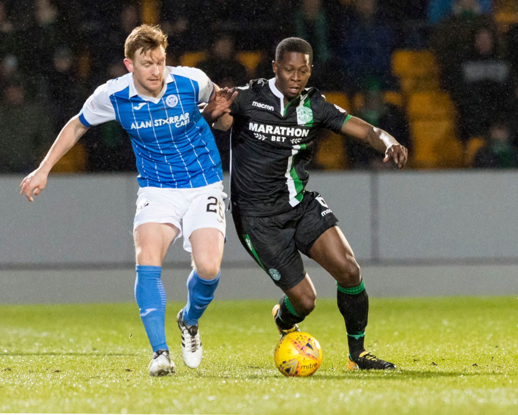 16th March 2018, McDiarmid Park, Perth, Scotland; Scottish Premier League football, St Johnstone versus Hibernian; Marvin Bartley of Hibernian and Liam Craig of St Johnstone challenge for the ball