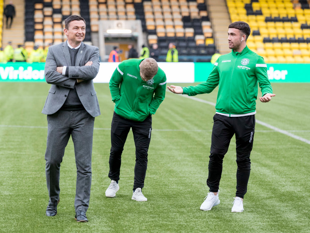 29th March 2019, Tony Macaroni Arena, Livingston, Scotland; Ladbrokes Premiership football, Livingston versus Hibernian; Stevie Mallan of Hibernian shares a joke with Paul Heckingbottom, Hibernian Manager before kick off