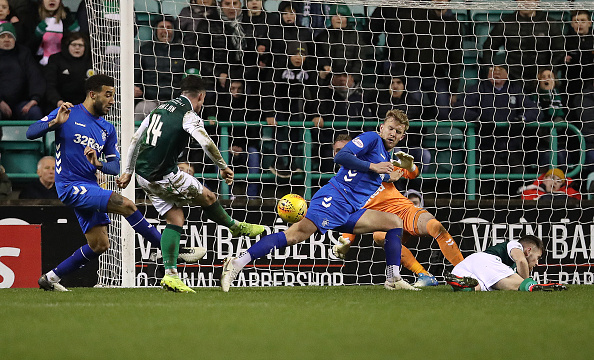 EDINBURGH, SCOTLAND - MARCH 08: Joe Worrall of Rangers blocks Stevie Mallan's shot during the Ladbrokes Premiership match between Hibernian and Rangers at Easter Road on March 08, 2019 in Edinburgh, United Kingdom.