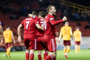 The event happened while Aberdeen winger McGinn was at Celtic.