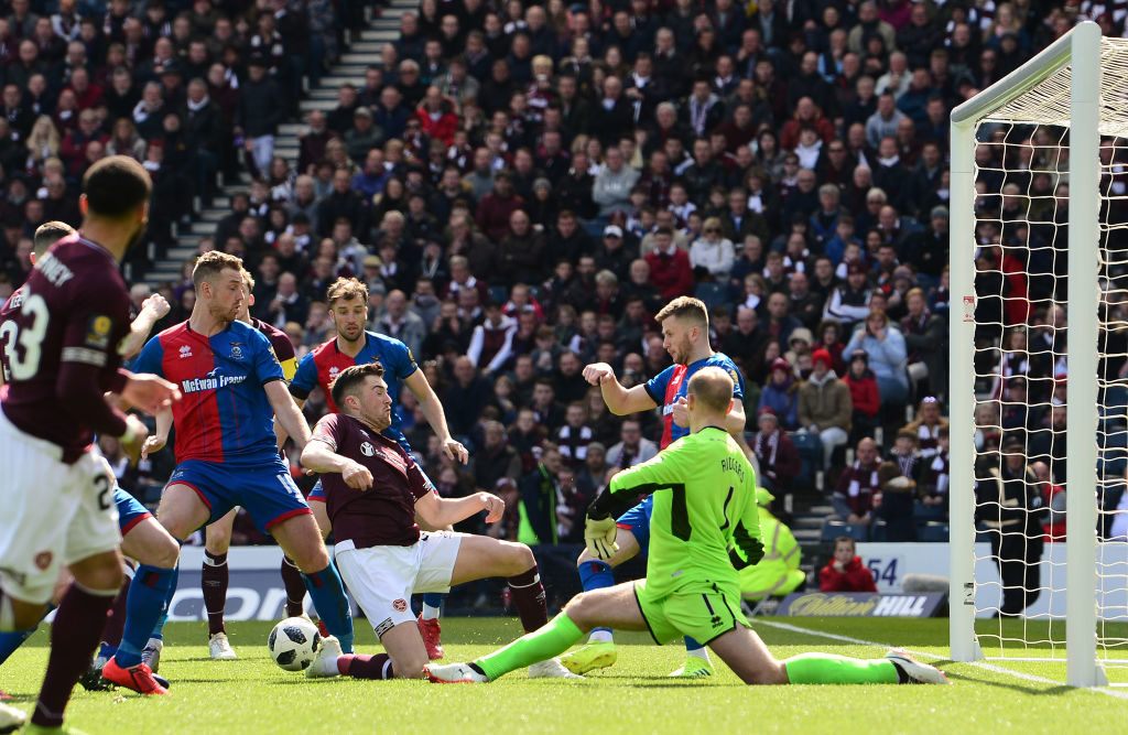 GLASGOW, SCOTLAND - APRIL 13: Mark Ridgers of Inverness Caledonian Thistle saves from John Souttar of Heart of Midlothian F.C. during the Scottish Cup Semi Final match between Heart of Midlothian and Inverness Caledonian Thistle at Hampden Park on April 13, 2019 in Glasgow, Scotland.