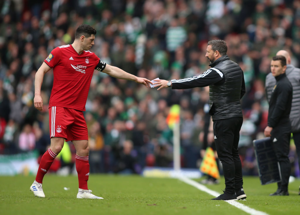 14th April 2019, Hampden Park, Glasgow, Scotland; Scottish Cup football, semi final, Aberdeen versus Celtic; Aberdeen Manager Derek McInnes passes tactical instructions to Scott McKenna of Aberdeen