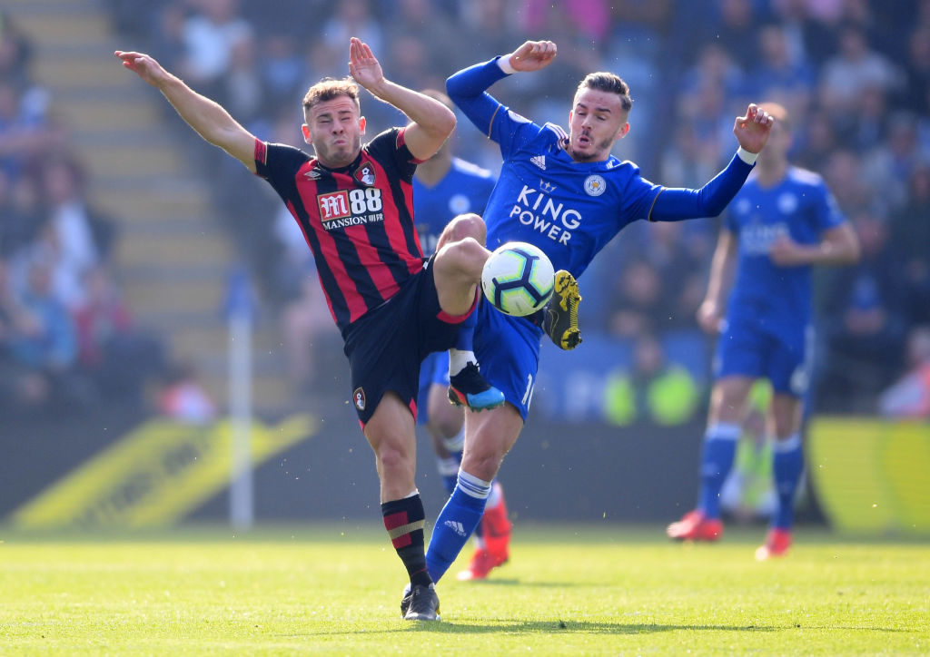 LEICESTER, ENGLAND - MARCH 30: Ryan Fraser of AFC Bournemouth battles for possession with James Maddison of Leicester City during the Premier League match between Leicester City and AFC Bournemouth at The King Power Stadium on March 30, 2019 in Leicester, United Kingdom.