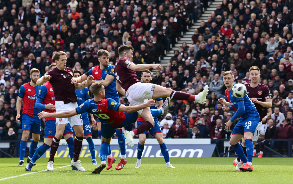 GLASGOW, SCOTLAND - APRIL 13: John Souttar of Heart of Midlothian F.C. scores his team's second goal during the Scottish Cup Semi Final match between Heart of Midlothian and Inverness Caledonian Thistle at Hampden Park on April 13, 2019 in Glasgow, Scotland.