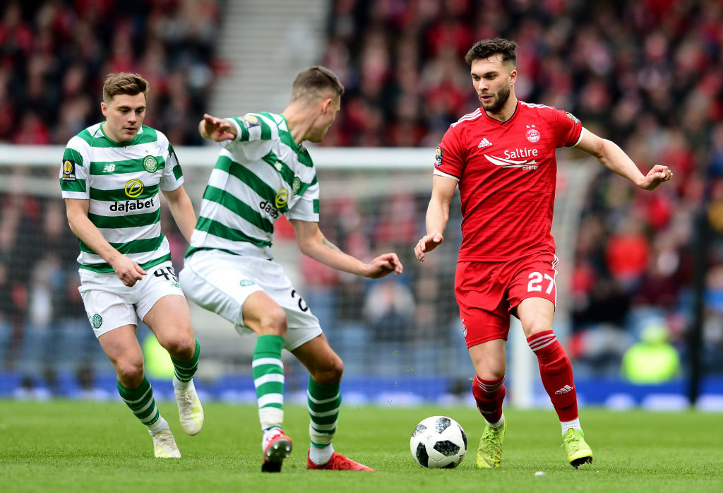 GLASGOW, SCOTLAND - APRIL 14: Mikael Lustig of Celtic taclkes Connor McLennan of Aberdeen during the Scottish Cup semi-final between Aberdeen and Celtic at Hampden Park on April 14, 2019 in Glasgow, Scotland.