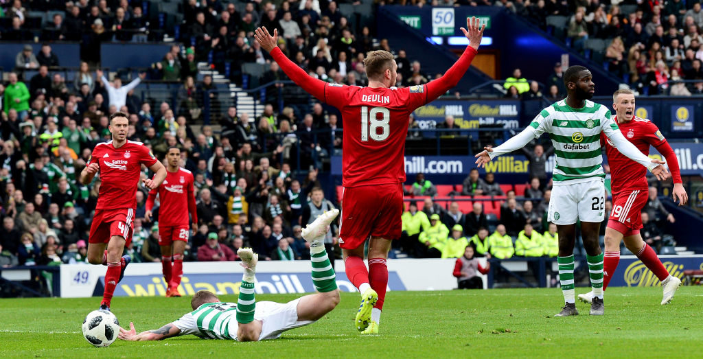 GLASGOW, SCOTLAND - APRIL 14: Jonathan Hayes of Celtic is fouled by Mikey Devlin of Aberdeen during the Scottish Cup semi-final between Aberdeen and Celtic at Hampden Park on April 14, 2019 in Glasgow, Scotland.