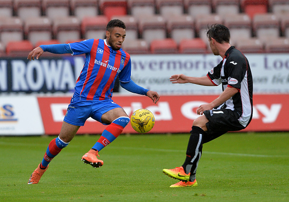 DUNFERMLINE, SCOTLAND - JULY 26: Jake Mulraney of Inverness Caledonian Thistle FC takes on Joseph Cardle of Dunfermline Athletic FC during the Betfred Cup match between Dunfermline Athletic FC and Inverness Caledonian Thistle FC at East End Park on July 26, 2016 in Dunfermline, Scotland.