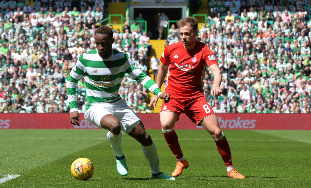 GLASGOW, SCOTLAND - MAY 13: Moussa Dembele of Celtic and Greg Stewart of Aberdeen in action during the Scottish Premier League match between Celtic and Aberdeen at Celtic Park on May 13, 2018 in Glasgow, Scotland.