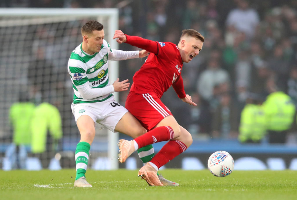 GLASGOW, SCOTLAND - DECEMBER 02: Lewis Ferguson of Aberdeen holds off Callum McGregor of Celtic during the Betfred Cup Final between Celtic and Aberdeen at Hampden Park on December 2, 2018 in Glasgow, Scotland.