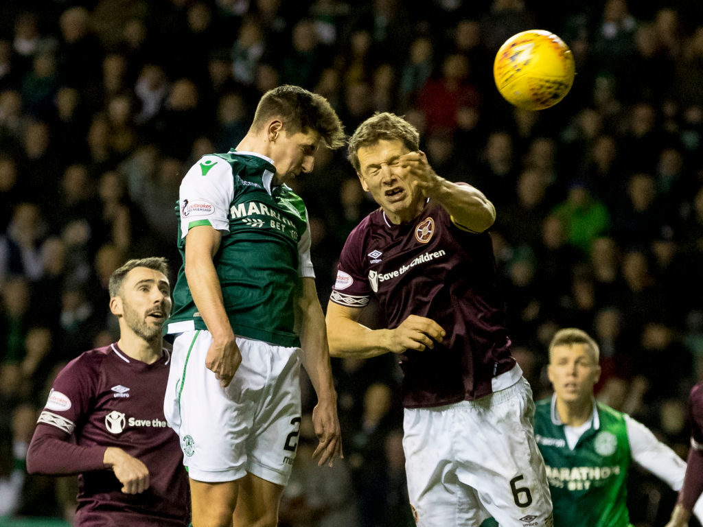 29th December 2018, Easter Road, Edinburgh, Scotland; Ladbrokes Premiership football, Hibernian versus Heart of Midlothian; Emerson Hyndman of Hibernian and Christophe Berra of Hearts compete for a header