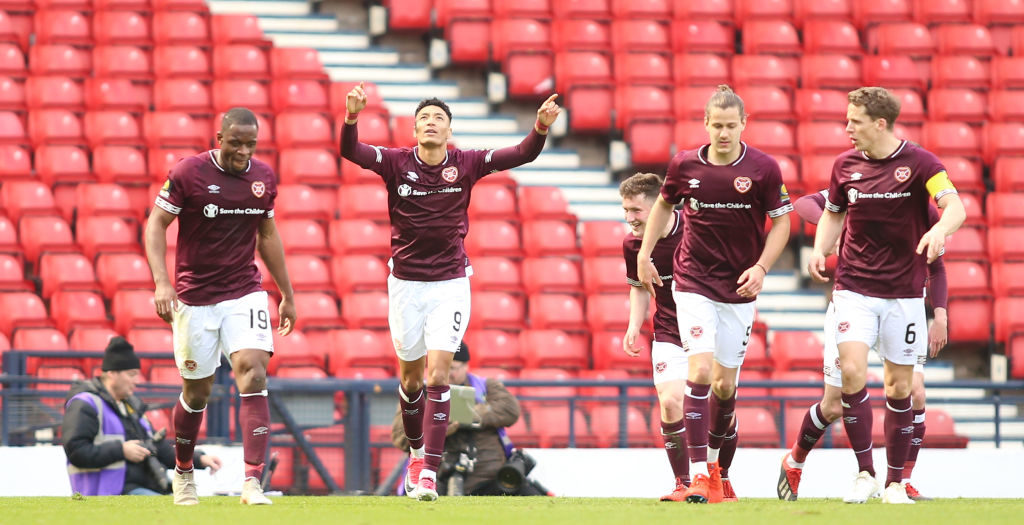 13th April 2019, Hampden Park, Glasgow, Scotland; Scottish Cup football, semi final, Heart of Midlothian versus Caledonian Thistle; Sean Clare of Heart of Midlothian points to the sky celebrating his goal that made it 3-0 in the 73rd minute