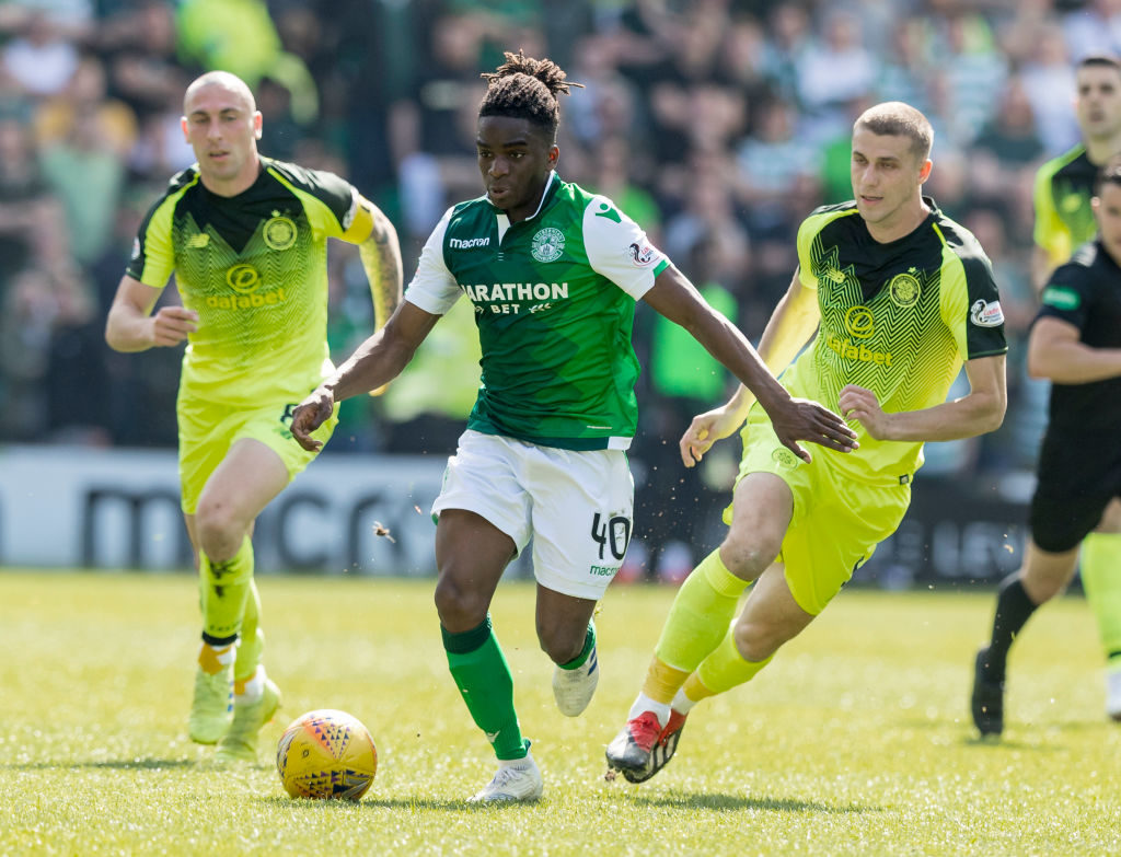 21st April 2019, Easter Road, Edinburgh, Scotland; Ladbrokes Premiership football, Hibernian versus Celtic; Stephane Omeonga of Hibernian gets away from Scott Brown and Jozo Simunovic of Celtic