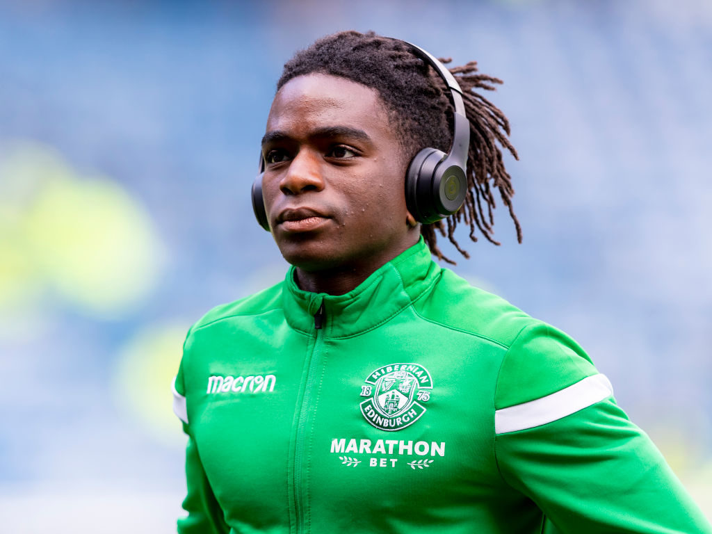 5th May 2019, Ibrox Stadium, Glasgow, Scotland; Ladbrokes Premiership football, Rangers versus Hibernian; Stephane Omeonga of Hibernian inspects pitch before kick off