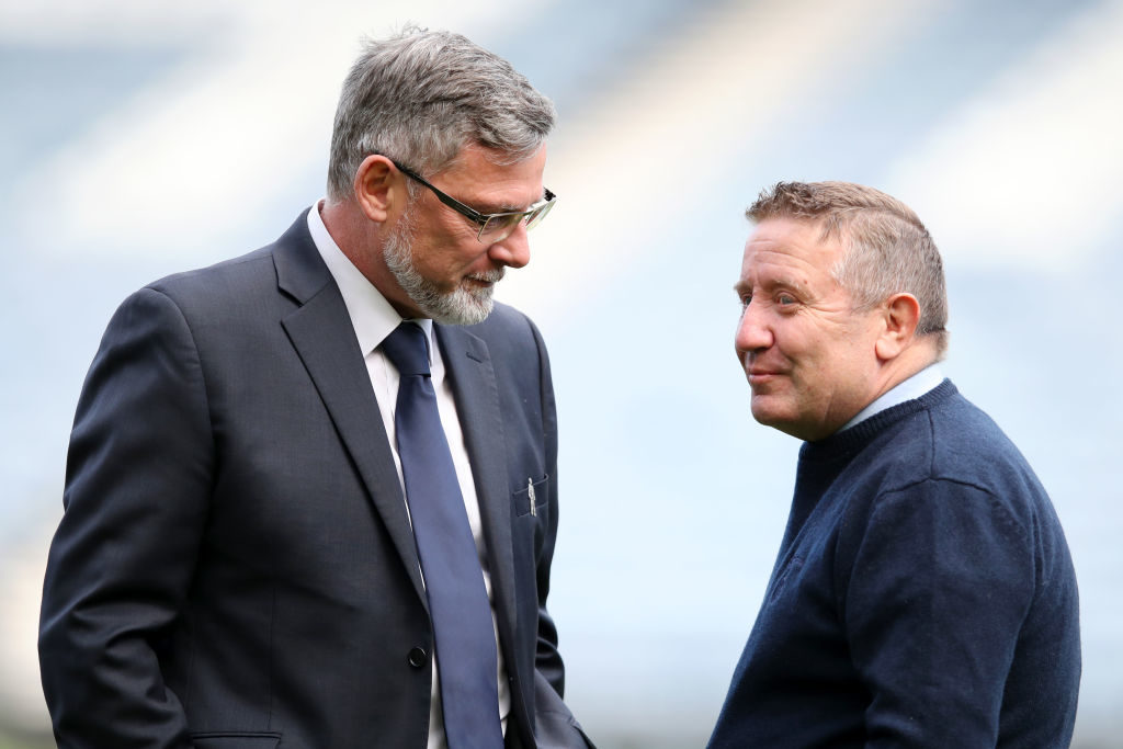 GLASGOW, SCOTLAND - APRIL 13: Craig Levein, Manager of Hearts speaks with John Robertson, Manager of Inverness Caledonian Thistle prior to the Scottish Cup Semi Final match between Heart of Midlothian and Inverness Caledonian Thistle at Hampden Park on April 13, 2019 in Glasgow, Scotland.