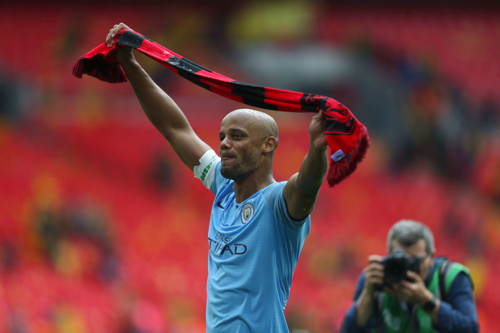 LONDON, ENGLAND - MAY 18: Vincent Kompany of Manchester City celebrates winning the FA Cup after the FA Cup Final match between Manchester City and Watford at Wembley Stadium on May 18, 2019 in London, England.