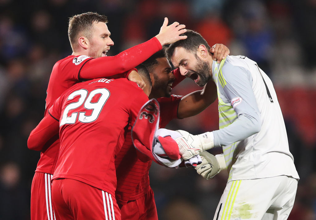 GLASGOW, SCOTLAND - OCTOBER 28: Joe Lewis, Max Lowe and Shay Logan of Aberdeen reacts at full time during the Betfred Scottish League Cup Semi Final match between Aberdeen and Rangers at Hapden Park on October 28, 2018 in Glasgow, Scotland.