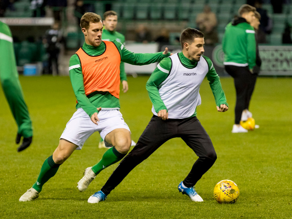 19th December 2018, Easter Road, Edinburgh, Scotland; Ladbrokes Premiership football, Hibernian versus Rangers; Steven Whittaker of Hibernian and Jamie Maclaren of Hibernian warm up pre match
