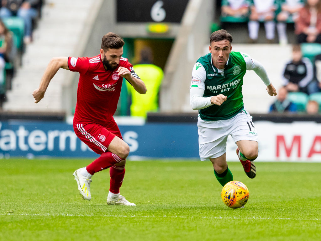 19th May 2019; Leith, Edinburgh, Scotland, Ladbrokes Scottish Premier League football, Hibernian versus Aberdeen; Stevie Mallan of Hibernian breaks away from Graeme Shinnie of Aberdeen