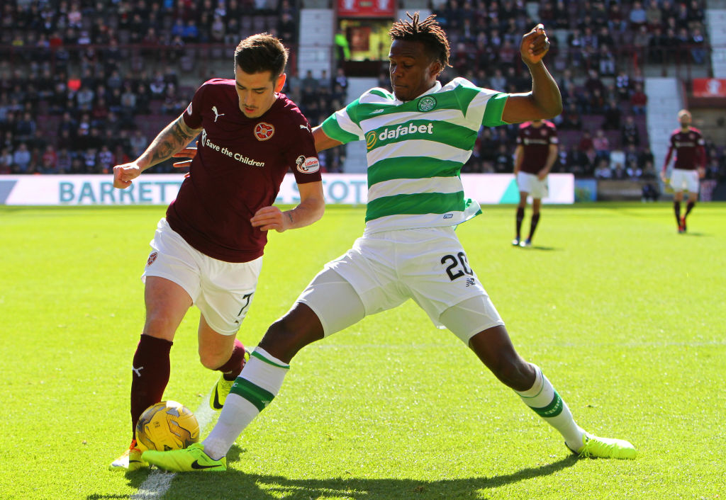 April 2nd 2017, Tynecastle, Edinburgh, Scotland, SPL Scottish premier League football, Hearts versus Celtic; Celtic's Dedryck Boyata nicks the ball away from Jamie Walker